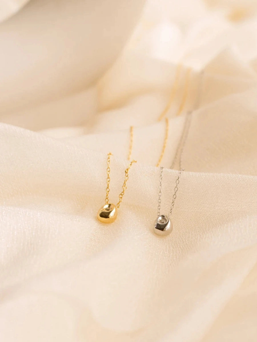 Колие от медицинска стомана с капковидна висулка и кристал цвят сребро