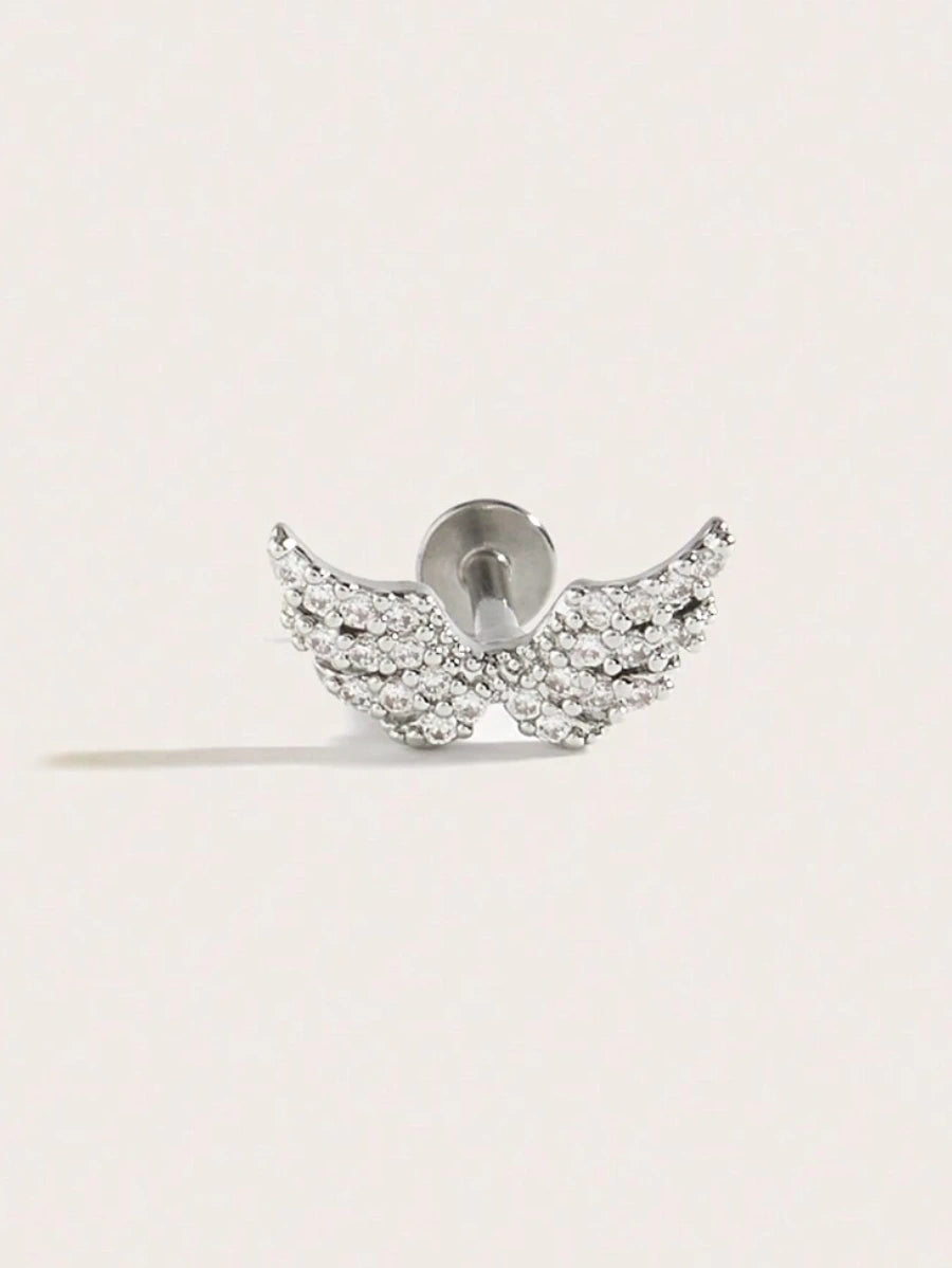 Един брой обеца за втора дупка във формата на Ангелски крила. Обецата е инкрустирана с кристали циркон и е в цвят сребро.