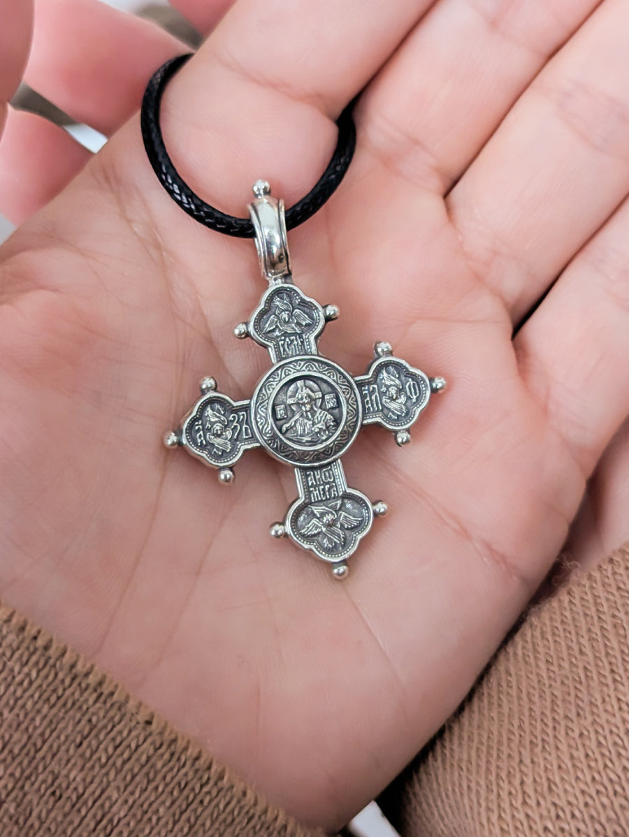 Сребърен православен кръст 925 с изображение на Иисус Христос Вседържител и релефни символи – лицева страна на двулицев медальон.