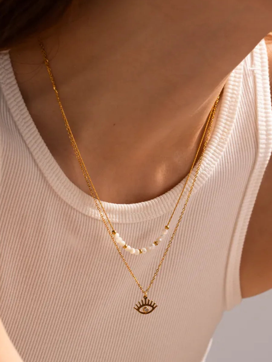 Двойно колие от медицинска стомана - бели маниста и око с кристал