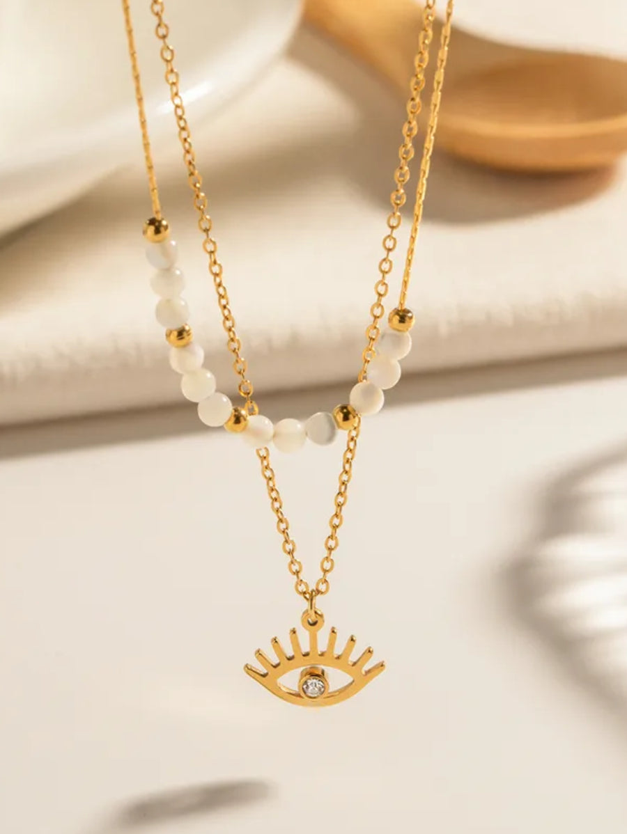 Двойно колие от медицинска стомана - бели маниста и око с кристал