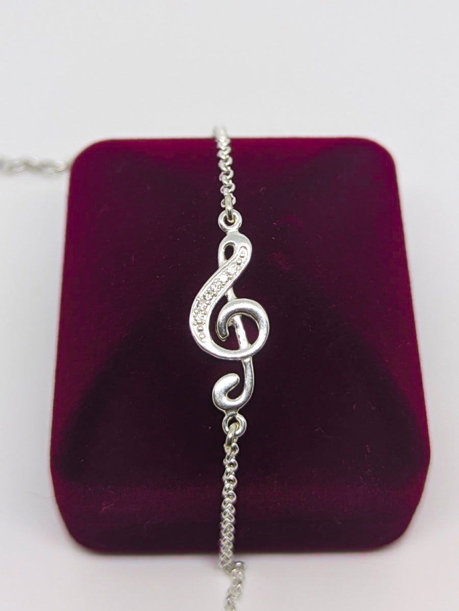 Сребърна гривна Ключ Сол с кристали